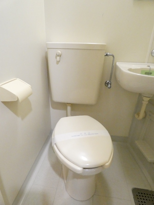 洗濯機置場。上部収納あり